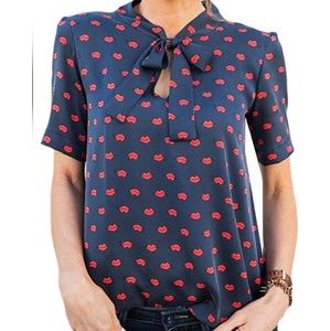 Blue top with red lips, shirt sleeves and bow tie